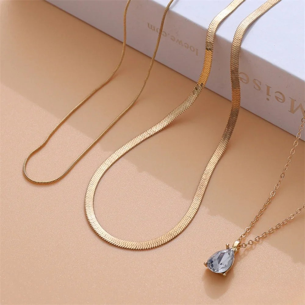 Layered necklace with gold-plated zirconia pendant